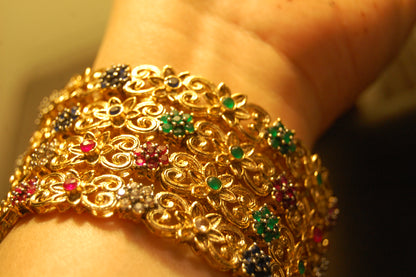 PAIR OF MULTI STONE BANGLES