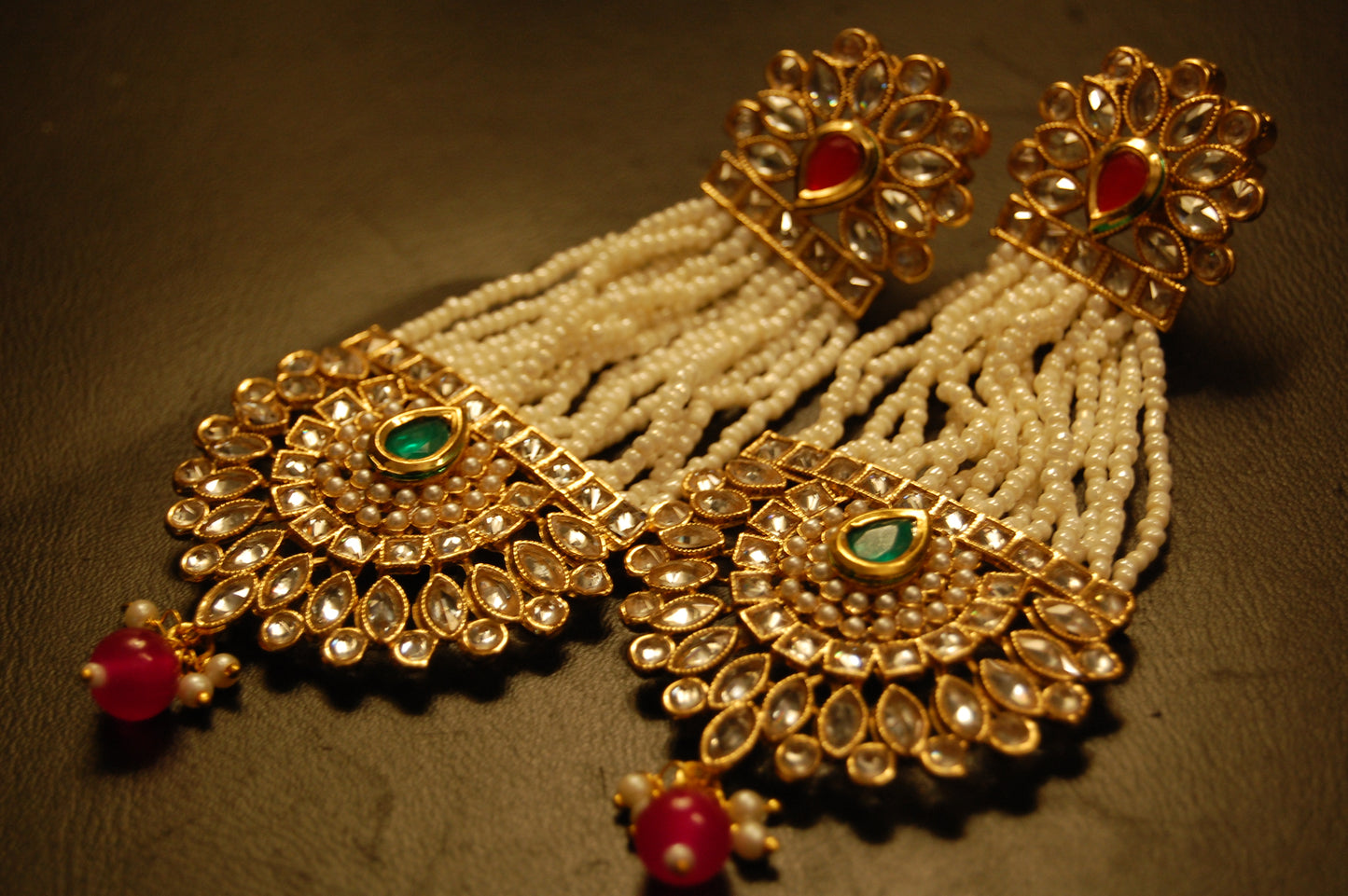 JHOOMAR STYLE EARRINGS IN KUNDAN, PEARLS, RED & GREEN