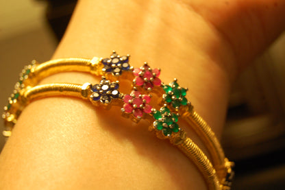 PAIR OF ELEGANT MULTI STONE BANGLES