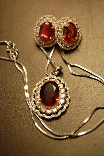 RED PENDENT SET IN ZIRCONS