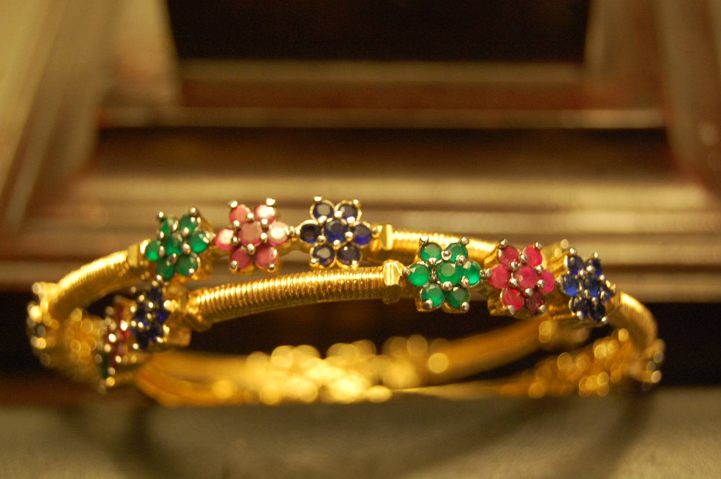 PAIR OF ELEGANT MULTI STONE BANGLES