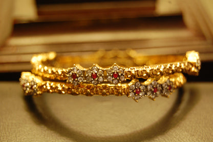 PAIR OF ELEGANT FLORAL RED & ZIRCON BANGLE