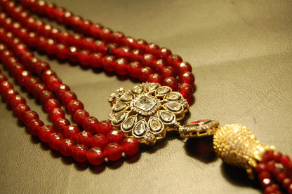 RUBY RED LONG MALA WITH TUSSEL