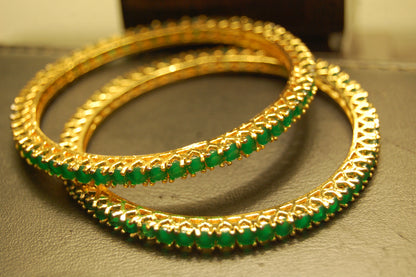 PAIR OF ELEGANT ZIRCON BANGLES