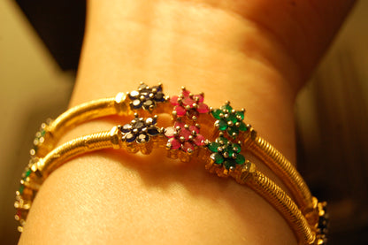 PAIR OF ELEGANT MULTI STONE BANGLES