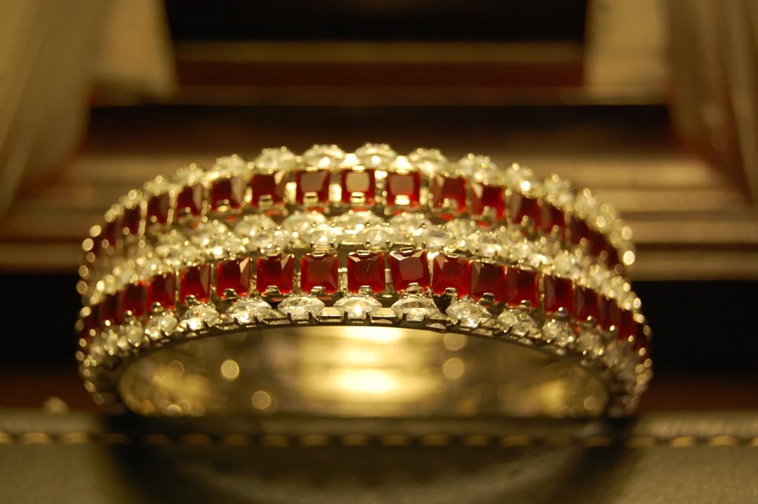 PAIR OF RED & ZIRCON BANGLES IN SILVER BASE