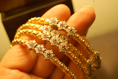 PAIR OF ELEGANT FLORAL RED & ZIRCON BANGLE