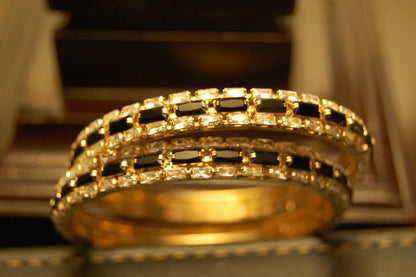 PAIR OF BLACK & ZIRCON BANGLES IN GOLDEN BASE