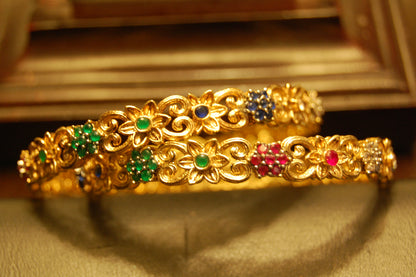 PAIR OF MULTI STONE BANGLES