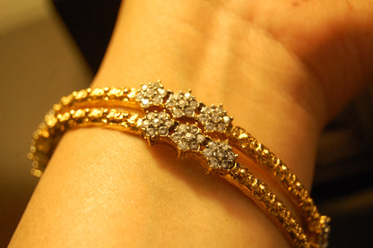 PAIR OF ELEGANT FLORAL ZIRCON BANGLE
