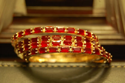 SET OF 4 RED & ZIRCON BANGLES IN GOLDEN BASE