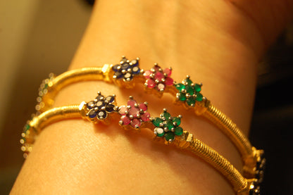 PAIR OF ELEGANT MULTI STONE BANGLES