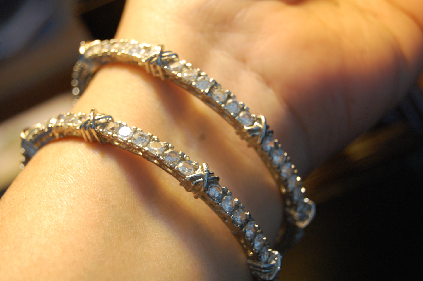 PAIR OF ZIRCON BANGLES (UNOPENABLE)