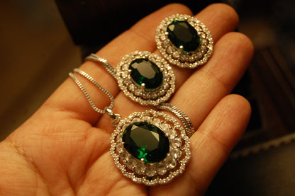 EMERALD GREEN PENDENT SET IN ZIRCONS