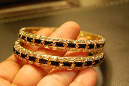 PAIR OF BLACK & ZIRCON BANGLES IN GOLDEN BASE